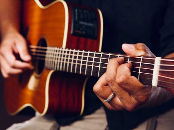 Man Playing Guitar